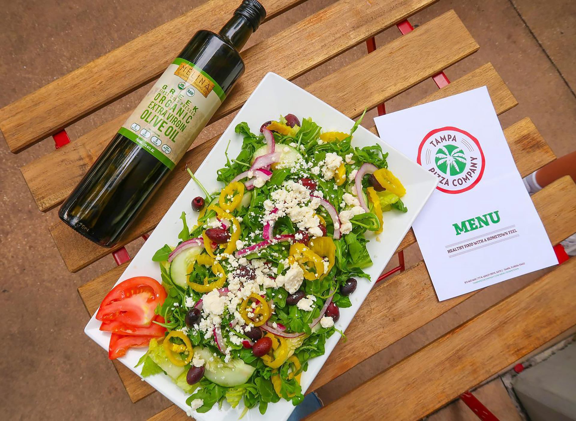 Tampa Pizza Company salad with Melina International Trading Olive Oil